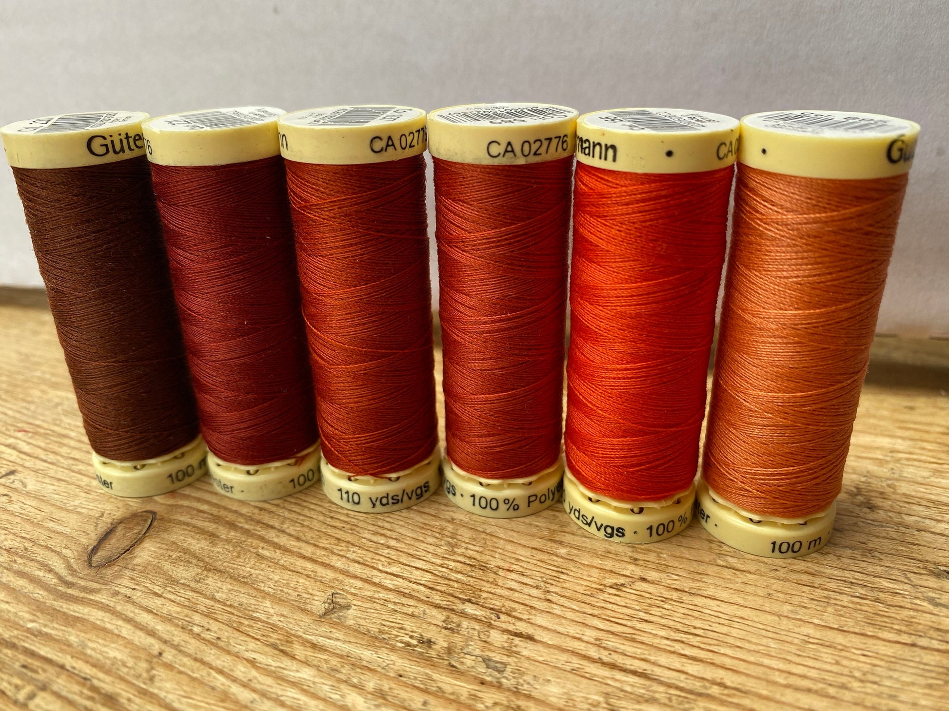 Gutterman sew all thread, orange tones, 100% Polyester, 100metres