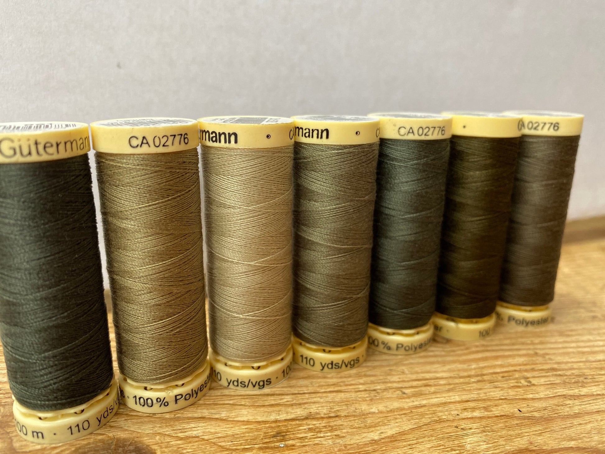 Gutterman sew all thread, 100% Polyester, 100metres, green tones